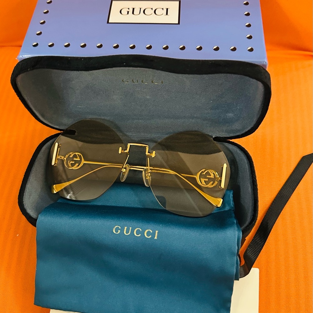 Gucci Black and Gold Sunglasses
